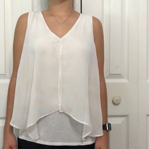 White flowey blouse  with gold detailing.